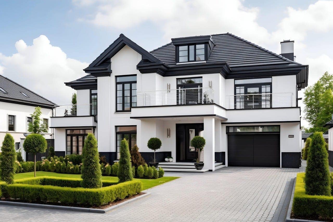 Completed modern home, white with black roof