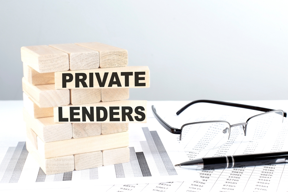 Private lenders written on wooden blocks on a chart background